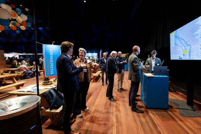 Mensen op het Deltacongres